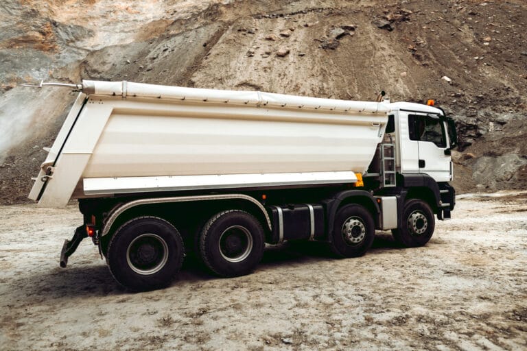 Dumper Trucks Unloading Gravel On Highway Construc 2026 01 05 00 52 51 Utc